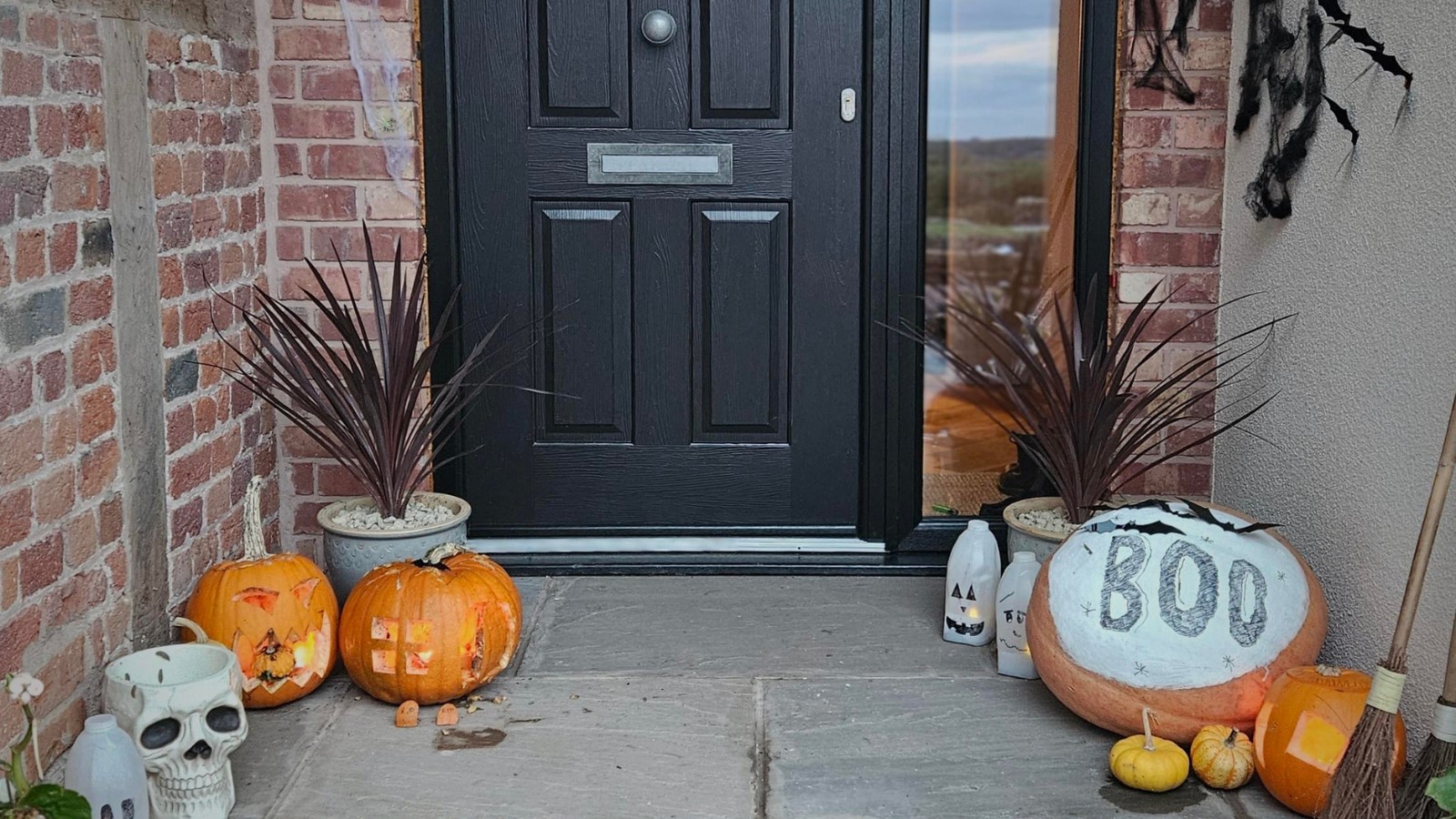 Black Tenby Solid Solidor with Halloween front door decorations