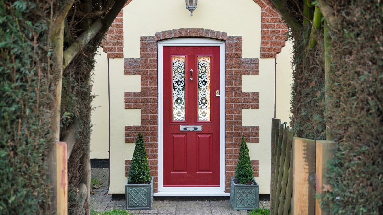 Ludlow 2 in Ruby Red with Tate glazing and potted plant decorations
